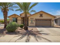 Inviting single-story home featuring desert landscaping and a two-car garage with a neutral color scheme at 5312 S 33Rd Ave, Phoenix, AZ 85041