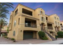 Beautiful multi-level home boasting multiple balconies, covered parking, and desert landscaping at 7122 W Ivanhoe St, Chandler, AZ 85226