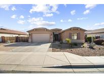 Charming single-story home featuring a well-maintained front yard and inviting curb appeal at 1101 W Oleander Ave, Queen Creek, AZ 85140
