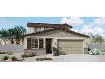 Charming two-story home featuring stone accents, a two-car garage, and professional landscaping at 546 N 89Th St, Mesa, AZ 85207