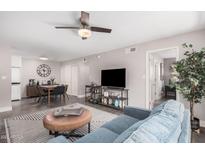 Inviting living room features modern furniture, stylish decor, and a large entertainment area at 6480 N 82Nd St # 1136, Scottsdale, AZ 85250
