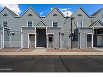Well-maintained townhouse exterior showing individual unit entrances and tidy landscaping at 1505 N Center St # 218, Mesa, AZ 85201