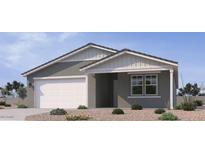 Charming single-story home showcasing modern architecture and a well-manicured, low maintenance front yard at 15796 W Beryl Ave, Waddell, AZ 85355