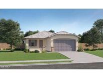Charming single-story home featuring a well-maintained front yard and a two-car garage at 16762 W Alameda Rd, Surprise, AZ 85387