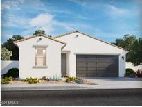 Charming single-story home featuring a two-car garage and low-maintenance desert landscaping at 2519 E Fortana Dr, San Tan Valley, AZ 85143