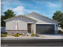 Charming single-story home with a two-car garage, neutral paint, and low maintenance desert landscaping at 31339 N Pinot Dr, San Tan Valley, AZ 85143