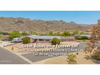 Inviting single-story home on a large lot boasting a pool and mountain views at 405 E Thunderbird Trl, Phoenix, AZ 85042