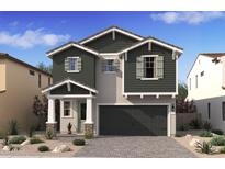 Charming two-story home featuring a two-car garage, stone accents, and a well-manicured desert landscape at 8030 W Griswold Rd, Peoria, AZ 85345