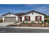 Charming single-story home boasts a two-car garage, low maintenance yard and complementary neutral palette at 18180 E Zuza Dr, Gold Canyon, AZ 85118