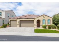 Charming single-Gathering home featuring a three-car garage, well-maintained landscaping, and tile roof at 24226 N 22Nd St, Phoenix, AZ 85024