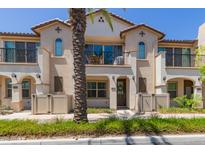 Charming two-story townhome featuring stucco siding, a balcony, and a private entrance at 4711 S Vapor --, Mesa, AZ 85212