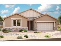 Charming single-story home with neutral stucco, stone accents, well-maintained landscaping, and a two-car garage at 40595 W Michaels Dr, Maricopa, AZ 85138