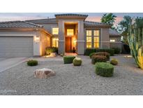 Beautiful home featuring desert landscaping, a tile roof, and an inviting front entryway at 4960 E Dale Ln, Cave Creek, AZ 85331