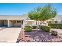 Charming single-story home featuring desert landscaping and a well-manicured yard, enhancing its curb appeal at 5209 N 78Th St, Scottsdale, AZ 85250