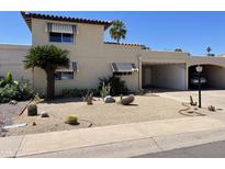 Charming single-Gathering home with desert landscaping and covered parking in a desirable neighborhood at 7637 E Thornwood Dr, Scottsdale, AZ 85251