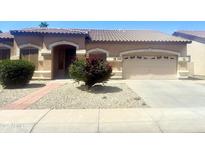 Charming single-story home featuring a well-maintained front yard with desert landscaping at 1390 E Jasper Dr, Gilbert, AZ 85296