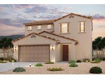Charming two-story home with a desert-landscaped yard and a tile roof at 2583 E Music Mountain Ave, Apache Junction, AZ 85119