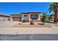 Charming single-story home featuring desert landscaping, a two-car garage, and a covered entry at 3114 E Capricorn Way, Chandler, AZ 85249