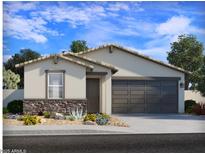 Charming single-story home featuring a two-car garage, stone accents, neutral colors, and a well-maintained desert-style yard at 7375 E Cozy Cottage Ln, San Tan Valley, AZ 85143