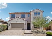 Two-story home with desert landscaping and a tile roof at 10158 W Angels Ln, Peoria, AZ 85383