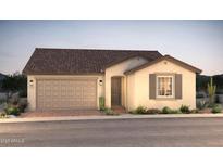 Charming single-story home with a two-car garage and desert landscaping at 16446 W Whispering Wind Dr, Surprise, AZ 85387
