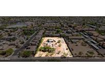 Expansive lot in a neighborhood setting with mature trees offering both privacy and charm at 1851 E Campo Bello Dr, Phoenix, AZ 85022