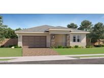 Charming single-story home with a two-car garage, manicured lawn, and stone pillar accents at 23146 E Lords Way, Queen Creek, AZ 85142