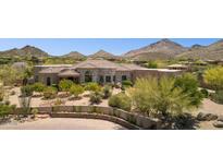Stunning desert home boasting stone accents, mature landscaping and paver driveway at 24200 N Alma School Rd # 7, Scottsdale, AZ 85255