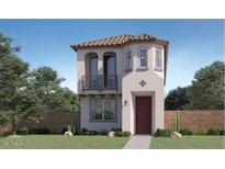 Charming home featuring a tile roof, small balcony, and inviting red front door at 3332 S Lotus Ave, Mesa, AZ 85212