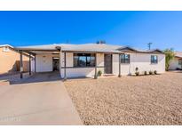 Charming single-story home featuring a well-maintained yard and a cozy, inviting entrance at 1001 W 19Th St, Tempe, AZ 85281