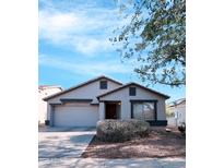 Charming single-story home featuring a well-maintained yard and a two-car garage at 16706 W Belleview St, Goodyear, AZ 85338