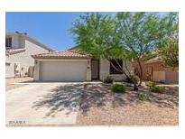 Charming single-Gathering home with a two-car garage and mature landscaping at 16813 S 30Th Ave, Phoenix, AZ 85045