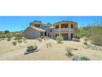 Stunning desert home featuring a unique architectural design and beautiful desert landscaping at 3903 E Melody Dr, Phoenix, AZ 85042