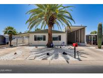 Charming single-story home with a lush palm tree in the front yard and a well-maintained exterior at 3307 E Kings Ave, Phoenix, AZ 85032