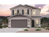 Charming two-story home with a two-car garage and well-manicured landscaping at 17278 W Paraiso Ln, Surprise, AZ 85387
