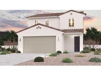 Charming two-story home boasts desert landscaping, a tile roof, and a spacious two-car garage at 17286 W Paraiso Ln, Surprise, AZ 85387