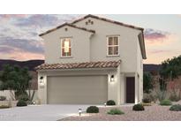 Charming two-story home with a tile roof, neutral stucco exterior, and a spacious two-car garage at 17380 W Jessie Ln, Surprise, AZ 85387