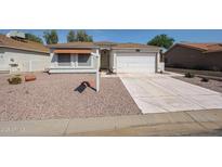 Charming single-story home with a two-car garage and low maintenance desert landscaping at 1920 E Westchester Dr, Chandler, AZ 85249