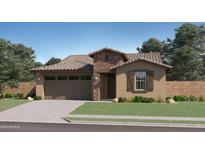 Charming single-Gathering home featuring a stone-accented facade and a well-manicured front lawn at 8048 E Paloma Ave, Mesa, AZ 85212
