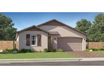 Charming single-story home with a two-car garage and well-manicured landscaping at 1432 W Ridge Rd, Apache Junction, AZ 85120
