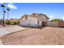 Charming two-story home features a stucco exterior, tile roof, and a two-car garage at 2755 W Calle Del Norte --, Chandler, AZ 85224