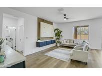 Bright living room featuring modern decor and a comfortable seating area at 8137 W Pueblo Ave, Phoenix, AZ 85043