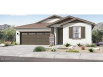 Charming single-story home featuring a two-car garage, neutral stucco exterior, and stylish brown accents at 14385 W Sand Hills Rd, Surprise, AZ 85387