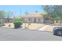 Charming single-story home featuring desert landscaping and a welcoming entrance, perfect for low-maintenance living at 14620 N Yerba Buena Way # B, Fountain Hills, AZ 85268