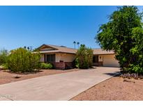 Well maintained, single story home with mature trees and long drive way at 2716 S Terrace Rd, Tempe, AZ 85282