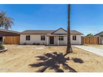 Charming single-story home featuring a well-maintained exterior and a spacious front yard at 3933 W Nancy Ln, Phoenix, AZ 85041