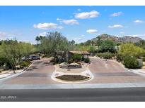 View of the community entrance and gate, Judson, with manicured landscaping at 6624 N 66Th N Pl, Paradise Valley, AZ 85253