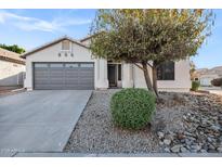 Charming single-story home with a well-maintained front yard and desert landscaping details at 896 N Kingston St, Gilbert, AZ 85233