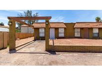 Charming single-story home with brick accents and mature trees in a well-maintained community at 2333 W Glenrosa W Ave # 113, Phoenix, AZ 85015
