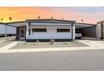 Charming single story home with awnings and desert landscaping at 2929 E Main St # 471, Mesa, AZ 85213